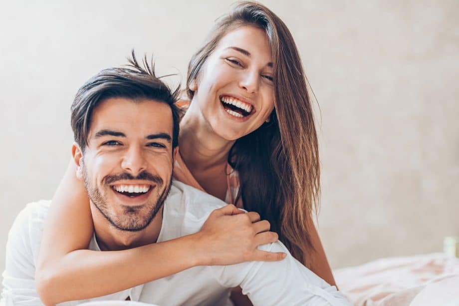 young couple smiling and laughing
